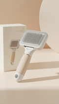 Self-cleaning pet grooming brush